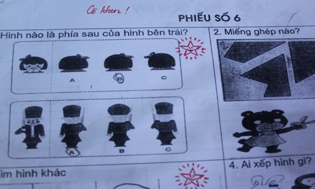 Hình ảnh lạ sau quy định mới của ngành giáo dục - 4 Bên cạnh con dấu, cô giáo cũng cẩn thận ghi lời nhận xét vào bài cho học sinh.