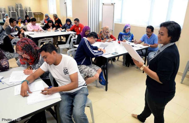 Phụ huynh đổ xô đi học lại toán tiểu học - 1 Phụ huynh đổ xô đi học lại toán tiểu học