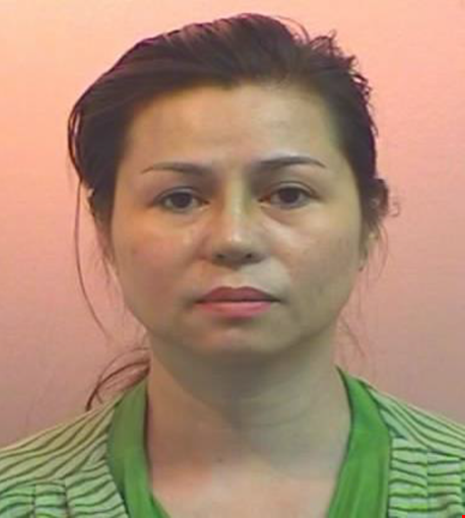 Singapore bỏ tù một phụ nữ Việt Nam dùng hộ chiếu giả - 1 Nguyen Thi Bich Lieu, 43 tuổi, bị bắt tại Singapore. Ảnh: ICA