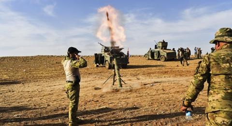 Mỹ lộ ý đồ xây lại thủ đô IS ở Raqqa? - 2 Quân đội PMF không cần trực thăng Mỹ hỗ trợ chống IS. Ảnh: Sputnik