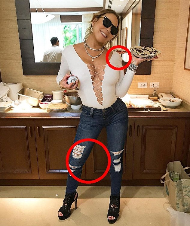 Mariah Carey tái xuất sau tin đồn chỉnh ảnh quá đà - 4
Trước đó khi chia sẻ hình ảnh chuẩn bị cho tiệc mừng lễ Tạ Ơn, Mimi bị fans la ó phản đối vì ảnh photoshop quá đà dẫn tới phần vai và chân của cô trở nên kỳ quái