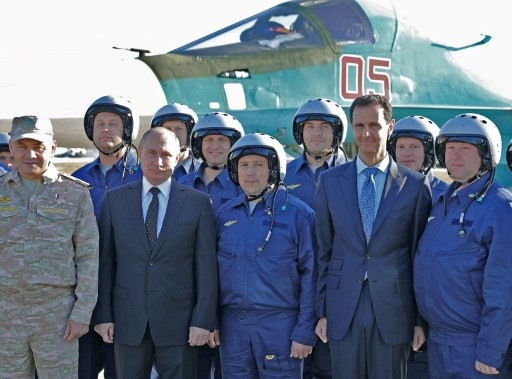Ông Putin ngắm dàn hộ tống Su-30 từ chuyên cơ thăm đột xuất Syria - 9
Sau hơn 2 năm, Nga tuyên bố đã giúp quân đội Syria đẩy lùi khủng bố. (Ảnh: AFP)