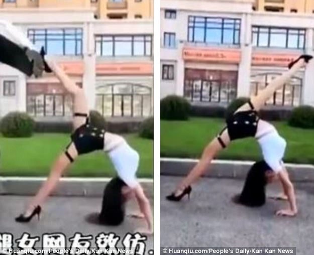 Trào lưu hài hước “đóng cốp xe bằng chân” để… đọ chân dài - 2 Người phụ nữ này còn khoe khả năng uốn dẻo của cơ thể và một đôi chân dài thẳng tắp với cú xoạc chân… “thẳng như một đường kẻ”.