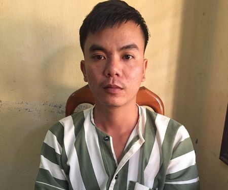 
Nghi phạm Võ Hồng Huy tại cơ quan
