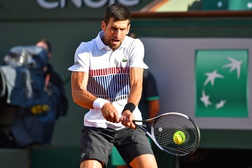 Roland Garros: Nadal, Djokovic vào tứ kết, ĐKVĐ Muguruza bị loại - 2
Djokovic dễ dàng vượt qua vòng 4