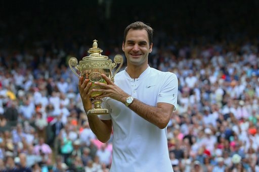Những khoảnh khắc đưa Federer tới chiến thắng thứ tám ở Wimbledon - 17
Chiếc cúp vô địch lần thứ tám sau 11 lần vào chung kết của Federer
