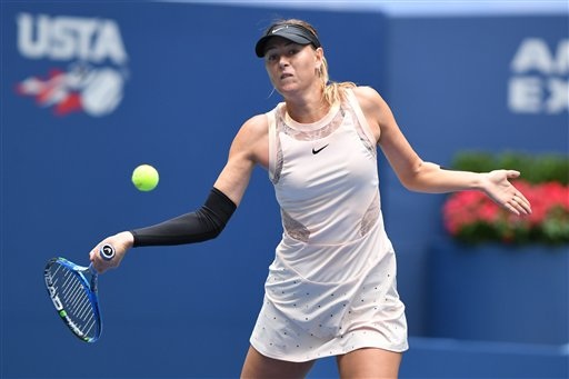 "Búp bê" Sharapova dừng bước trước ngưỡng cửa tứ kết - 1
Sharapova đã không thể tiến vào tứ kết Mỹ mở rộng