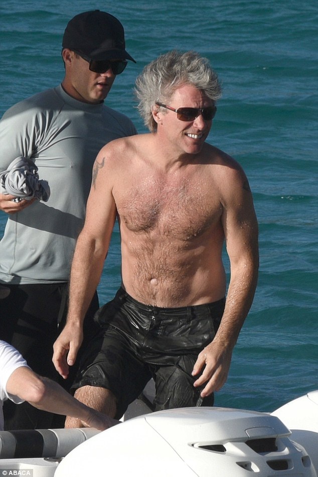  Jon Bon Jovi shows off his athletic and athletic body on St Barths Beach on January 1. The famous American rocker is celebrating the New Year here with friends and family 