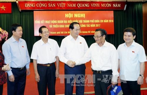 Chủ tịch nước: Tiếp tục nâng cao chất lượng dân nguyện, trách nhiệm giúp dân - 1
Chủ tịch nước Trần Đại Quang với các đại biểu dự hội nghị. Ảnh: Nhan Sáng-TTXVN