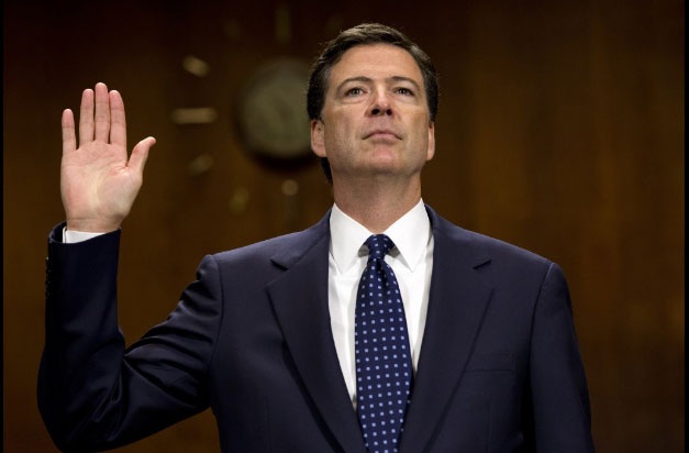 Biểu tình phản đối Tổng thống Trump bên ngoài Nhà Trắng - 1
Ông James Comey được cựu Tổng thống Barack Obama bổ nhiệm làm giám đốc Cục Điều tra Liên bang Mỹ (FBI) tháng 9/2013. Nhiệm kỳ của giám đốc FBI thường kéo dài 10 năm, nhưng ông Comey bị Tổng thống Trump sa thải khi mới tại vị chưa đầy 4 năm. (Ảnh: AP)