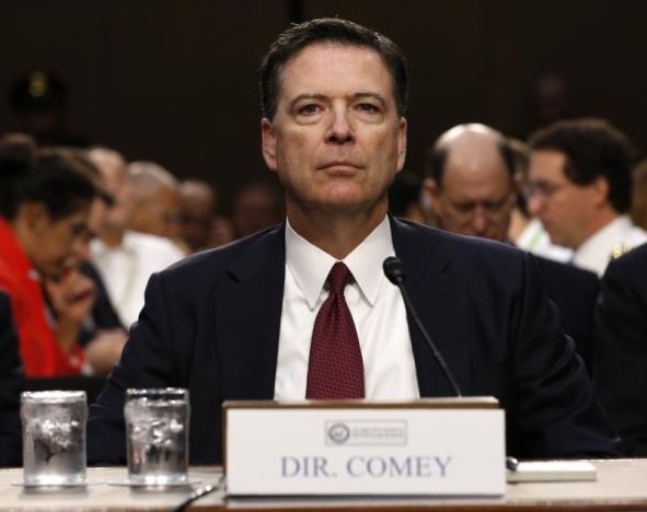 Cựu Giám đốc FBI nghi ngờ Nhà Trắng nói dối - 8
Ông Comey trong cuộc điều trần (Ảnh: Reuters)