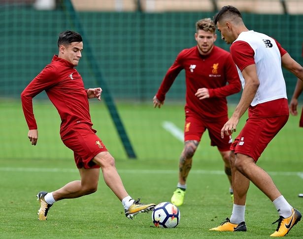 Cười tươi rói khi trở lại Liverpool, Coutinho đập tan tin đồn ra đi - 7
