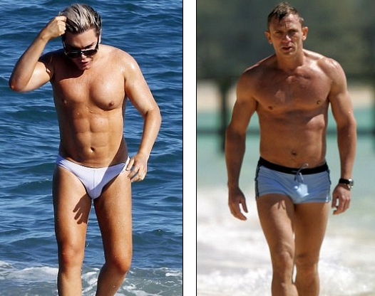 "Búp bê Ken" Rodrigo Alves khoe thân hình 6 múi - 1
Rodrigo Alves sải bước trên bãi biển Marbella chẳng khác gì Daniel Craig (phải) trong phim Điệp viên 007