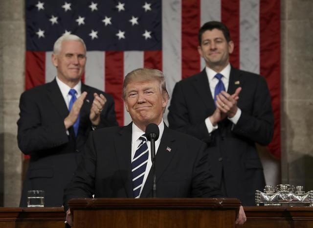 Ông Trump: Hãy tin nước Mỹ một lần nữa - 1
Tổng thống Mỹ Donald Trump phát biểu lần đầu tại phiên họp chung của Quốc hội ngày 28/2. (Ảnh: Reuters)
