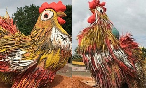 Nhân tết đến, nghĩ về gà Quảng Ngãi - 1
Mô hình gà với chiều cao gần 2 mét, màu sắc rực rỡ, làm bằng lá dừa, trưng bày tại công viên Ba Tơ – trung tâm của TP. Quảng Ngãi trong dịp cổ truyền sắp đến. (Ảnh: vnExpess)