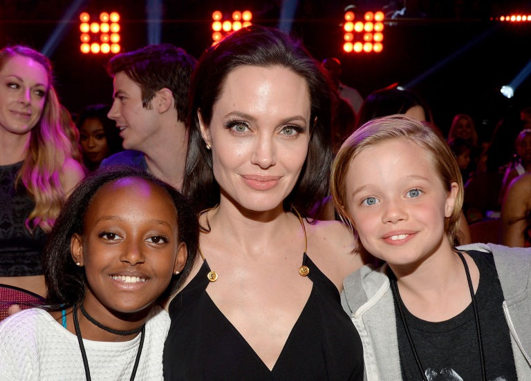  Zahara Jolie-Pitt (left) with her adoptive mother, Angelina Jolie, and younger sister Shiloh Jolie-Pitt 