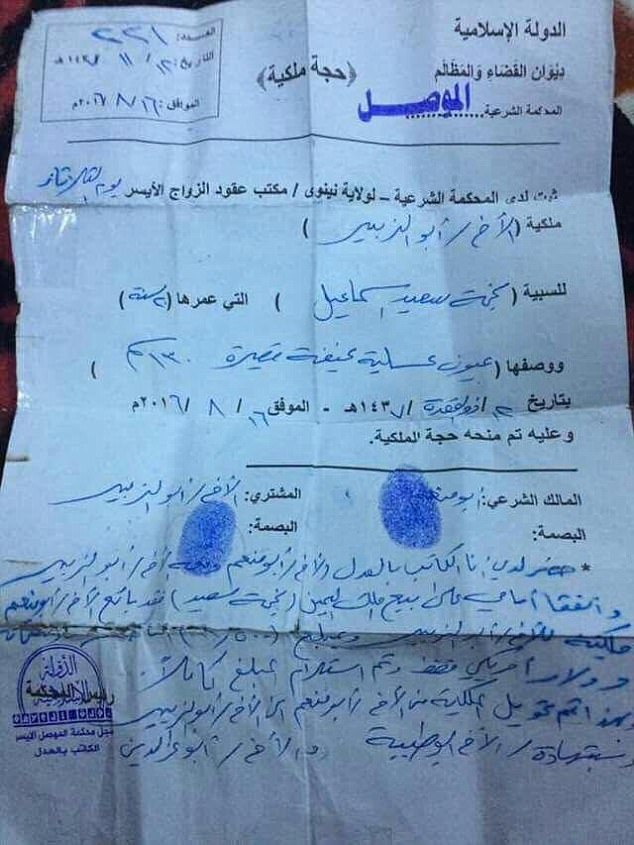 
Tờ giấy nghi là hóa đơn mua bán nô lệ tình dục của IS tại Mosul (Ảnh: Dailymail)

