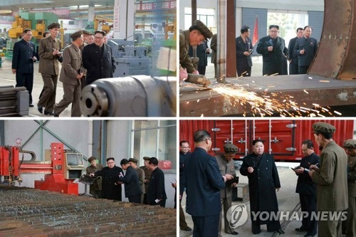 Ông Kim Jong-un muốn đưa ô tô Triều Tiên sánh ngang thế giới - 1 Hãng thông tấn quốc gia Triều Tiên (KCNA) ngày 4/11 đưa tin nhà lãnh đạo Kim Jong-un đã tới thị sát nhà máy 16/3 chuyên chế tạo các xe tải cỡ lớn tại Triều Tiên. Ông Kim cho biết nhà máy 16/3 đã cho thấy “đường lối chỉ đạo sáng suốt và sự quan tâm tận tình” của hai cố lãnh đạo Kim Nhật Thành và Kim Jong-il kể từ khi nhà máy này được thành lập từ ngày 16/3/1977. (Ảnh: Yonhap)