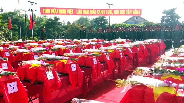 An táng 104 hài cốt quân tình nguyện, chuyên gia Việt Nam hy sinh tại Lào - 6