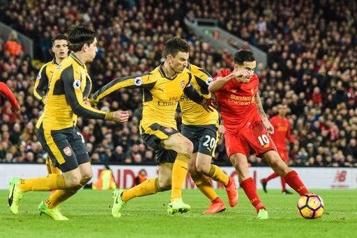 Arsenal hay Liverpool sẽ có suất dự Champions League? - 2
Arsenal (áo vàng) thi đấu với Liverpool (áo đỏ) trong trận lượt về tại Emirates vào tháng 3 vừa qua
