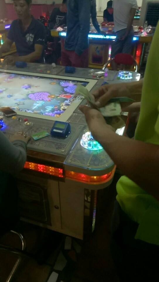 Thâm nhập sòng bạc khủng núp bóng tiệm game bắn cá - 4 Việc đổi điểm ra tiền diễn ra tại bàn.