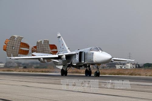 Giải mã việc Nga đang 'thắng' Mỹ ở Trung Đông - 2
Máy bay ném bom Su-24 của Nga hạ cánh tại căn cứ quân sự Hmeymim ở tỉnh Latakia, Syria năm 2015. Ảnh: AFP/TTXVN