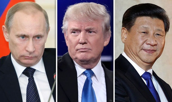Giải mã việc ông Trump mềm với Nga, nhưng rắn với Trung Quốc - 1
(Từ trái sang phải) Tổng thống Nga Vladimir Putin, Tổng thống đắc cử Mỹ Donald Trump, Chủ tịch Trung Quốc Tập Cận Bình. (Ảnh: Getty)
