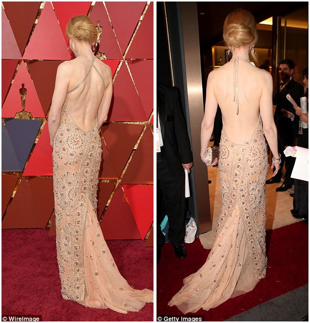 Có điều gì kỳ lạ ở bộ đầm của “thiên nga Úc” Nicole Kidman? - 4 Bạn có nhận ra điều gì khác lạ ở chiếc váy của Nicole Kidman? Dường như sự bó sát của quai váy gây khó chịu, rộp da, khiến Kidman phải cắt dây để buộc lại, thả lỏng, nhằm tạo cảm giác dễ chịu hơn trong suốt lễ trao giải kéo dài 4 tiếng.