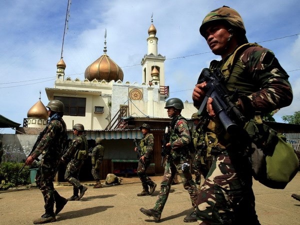 Philippines duy trì tình trạng thiết quân luật tại Mindanao - 1
Lực lượng binh sỹ Philippines. (Nguồn: alwaght.com)