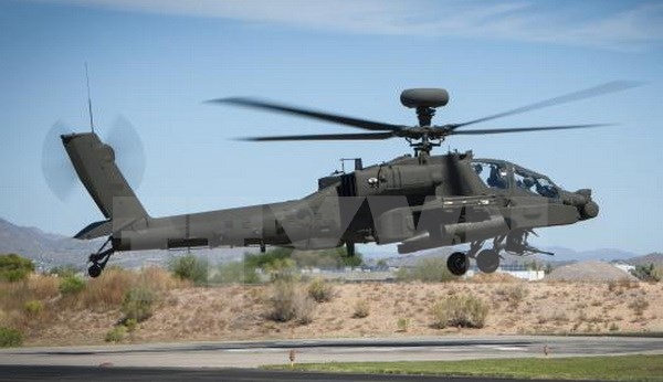 Hàn Quốc hoàn tất kế hoạch triển khai 36 trực thăng Apache - 1 Máy bay lên thẳng phiên bản được nâng cấp mới nhất AH-64E Guardian. (Nguồn: Yonhap/TTXVN)