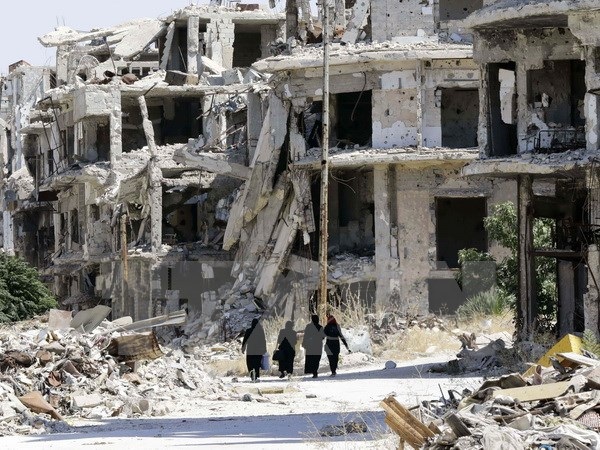 Lực lượng nổi dậy Syria bắt đầu rời khỏi thành phố Homs - 1 Cảnh đổ nát do chiến sự ở thành phố Homs, miền trung Syria ngày 19/9/2016. (Nguồn: AFP/TTXVN)