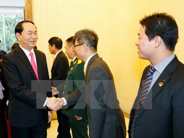 Chủ tịch nước Trần Đại Quang thăm Đại sứ quán Việt Nam tại Trung Quốc - 1 Chủ tịch nước Trần Đại Quang đến thăm và nói chuyện với cán bộ, nhân viên Đại sứ quán Việt Nam tại Trung Quốc. (Ảnh: Nhan Sáng/TTXVN)