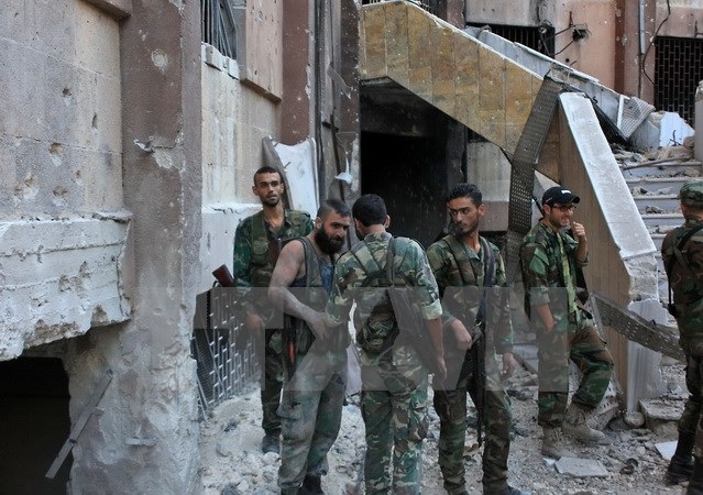 IS tấn công quân Chính phủ Syria làm hàng chục người thương vong - 1 IS tấn công quân Chính phủ Syria làm hàng chục người thương vong - 1