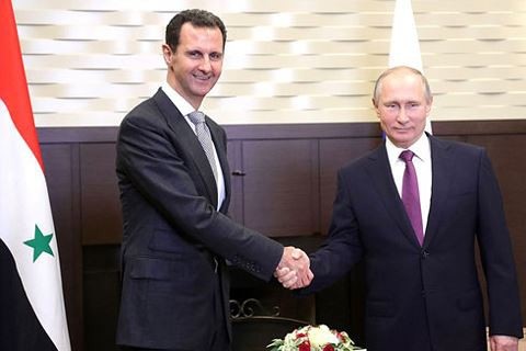 
Tổng thống Nga Vladimir Putin (phải) hội đàm với Tổng thống Syria Bashar al-Assad tại Matxcơva ngày 21-11
