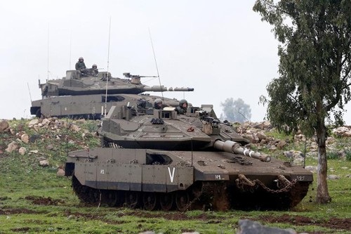 Lằn ranh đỏ của Israel - 1
Binh lính Israel trong cuộc tập trận gần đường ngừng bắn giữa Israel và Syria tại cao nguyên Golan hồi tháng 3 Ảnh: REUTERS