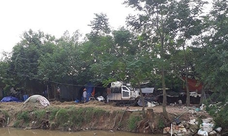 Những bí ẩn ở “trại chó” Thanh Trì - 1 Khu “trại chó” mà hạ văn Dũng và đồng bọn sử dụng làm nơi trung gian nhận xe ăn cắp.