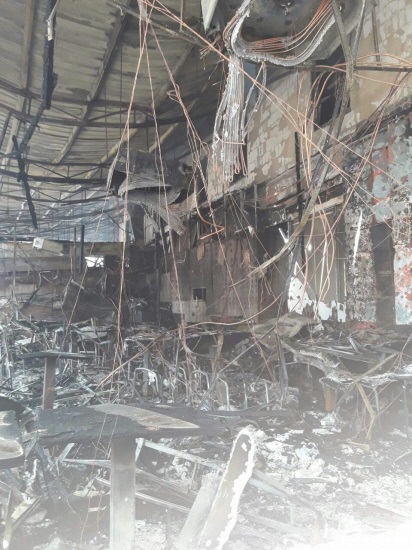 Đồ đạc trong 2 nhà hàng bị hư hại nặng. Ảnh: THE SUN DAILY