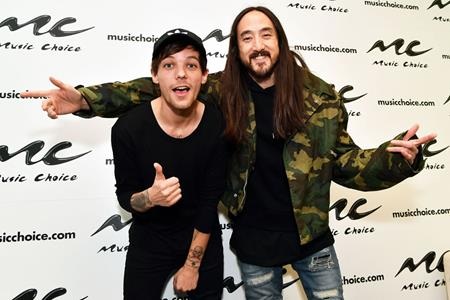 Điểm danh các sao đang “xả hơi” hết cỡ dịp năm mới - 15 Cựu thành viên nhóm One Direction, Louis Tomlinson quậy tưng bừng cùng Steve Aoki tại New York, nước Mỹ