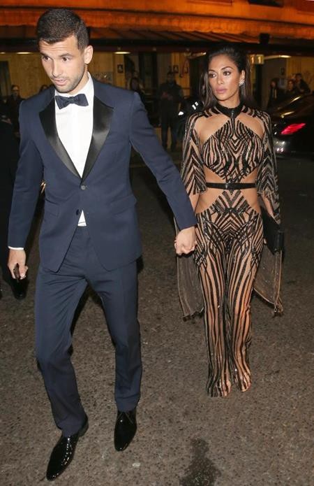 Những ngôi sao thể thao bị vợ đẹp “át vía” - 8 Grigor Dimitrov là tay vợt thứ ba trên thế giới. Còn Nicole Scherzinger lại là cựu thành viên của nhóm Pussycat Dolls, từng giữ ghế giám khảo X Factor, đã có 11 năm ca hát với hơn 60 triệu doanh thu bán đĩa và có lẽ, không khó để đánh giá chàng hay nàng mới là người nổi tiếng hơn trong mắt người hâm mộ.