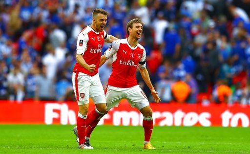 Vượt qua Chelsea, Arsenal giành cúp FA - 1
Ramsey (trái) ăn mừng sau khi ghi bàn