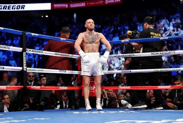 "Độc cô cầu bại" Mayweather hạ knock-out McGregor - 12 "Độc cô cầu bại" Mayweather hạ knock-out McGregor - 12