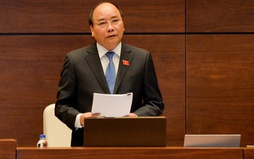 Thủ tướng trả lời chất vấn, cam kết giải thể ban chỉ đạo yếu kém - 1 Thủ tướng Nguyễn Xuân Phúc trong một phiên đăng đàn trả lời chất vấn tại Quốc hội