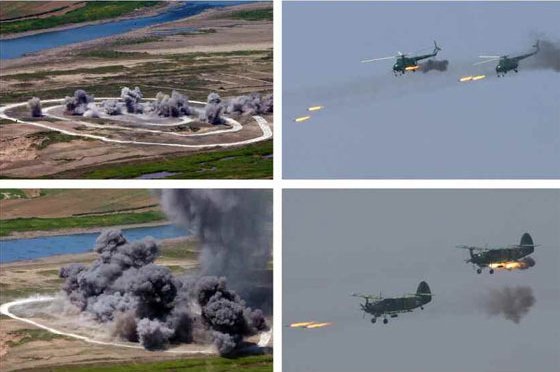 Mãn nhãn màn "so găng" của máy bay chiến đấu Triều Tiên - 8 Các trực thăng Mil Mi-2 và AN-2 phô diễn kỹ năng tấn công mục tiêu mặt đất (Ảnh: Rodong Sinmun)