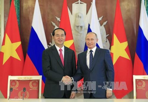 Việt - Nga hợp tác, mở rộng thăm dò và khai thác dầu khí trên biển - 1 Chủ tịch nước Trần Đại Quang và Tổng thống Nga Vladimir Putin đánh giá tình hình và triển vọng tiếp tục củng cố quan hệ Đối tác chiến lược toàn diện giữa Việt Nam và Nga (ảnh: TTXVN)