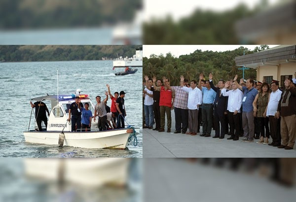 Tổng thống Philippines tiễn 5 ngư dân Việt Nam bị bắt về nước - 4 Tổng thống Duterte (thứ 5 từ trái sang ảnh phải) vẫy tay chào các ngư dân Việt Nam tại cảng Sual, Pangasinan. (Ảnh: Philstar)