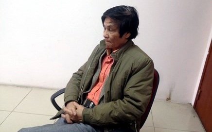 Ông Vũ Trọng Tiến tại trụ sở công an.