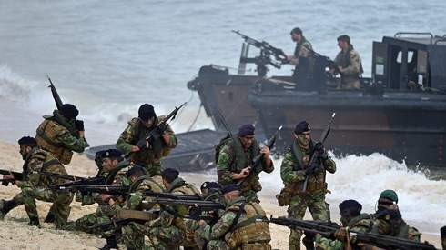 Nga-NATO so kè, Bắc Cực sẽ trở thành “đấu trường” khốc liệt? - 1
Các binh sĩ tham gia cuộc tập trận Trident Juncture của NATO hồi năm 2015. Ảnh: AFP.