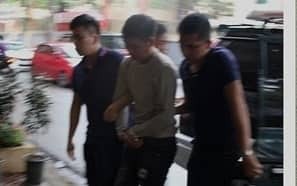 Bắt nghi phạm sát hại chủ tiệm tóc rồi đốt xác - 1 Nghi phạm bị dẫn giải về trụ sở Công an TP. Hải Phòng (ảnh công an HP)