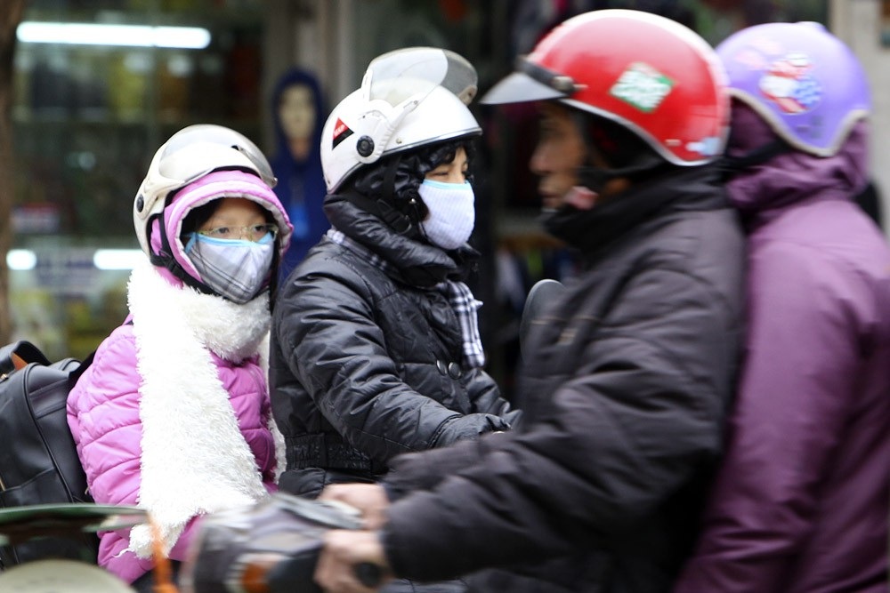 Hà Nội rét đậm, đường phố vắng vẻ trong ngày đầu nghỉ lễ - Ảnh 12. Hà Nội rét đậm, đường phố vắng vẻ trong ngày đầu nghỉ lễ - Ảnh 12.