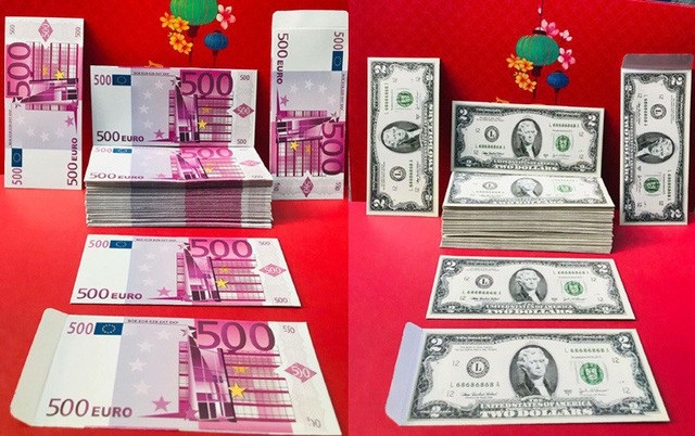 Bao lì xì “500 ngàn đồng” giá bèo; cá mặt quỷ siêu xấu giá chục triệu đồng/con - 2
Ngoài bao lì xì tiền Việt Nam đồng, thị trường còn xuất hiện mẫu bao lì xì tiền nước ngoài.